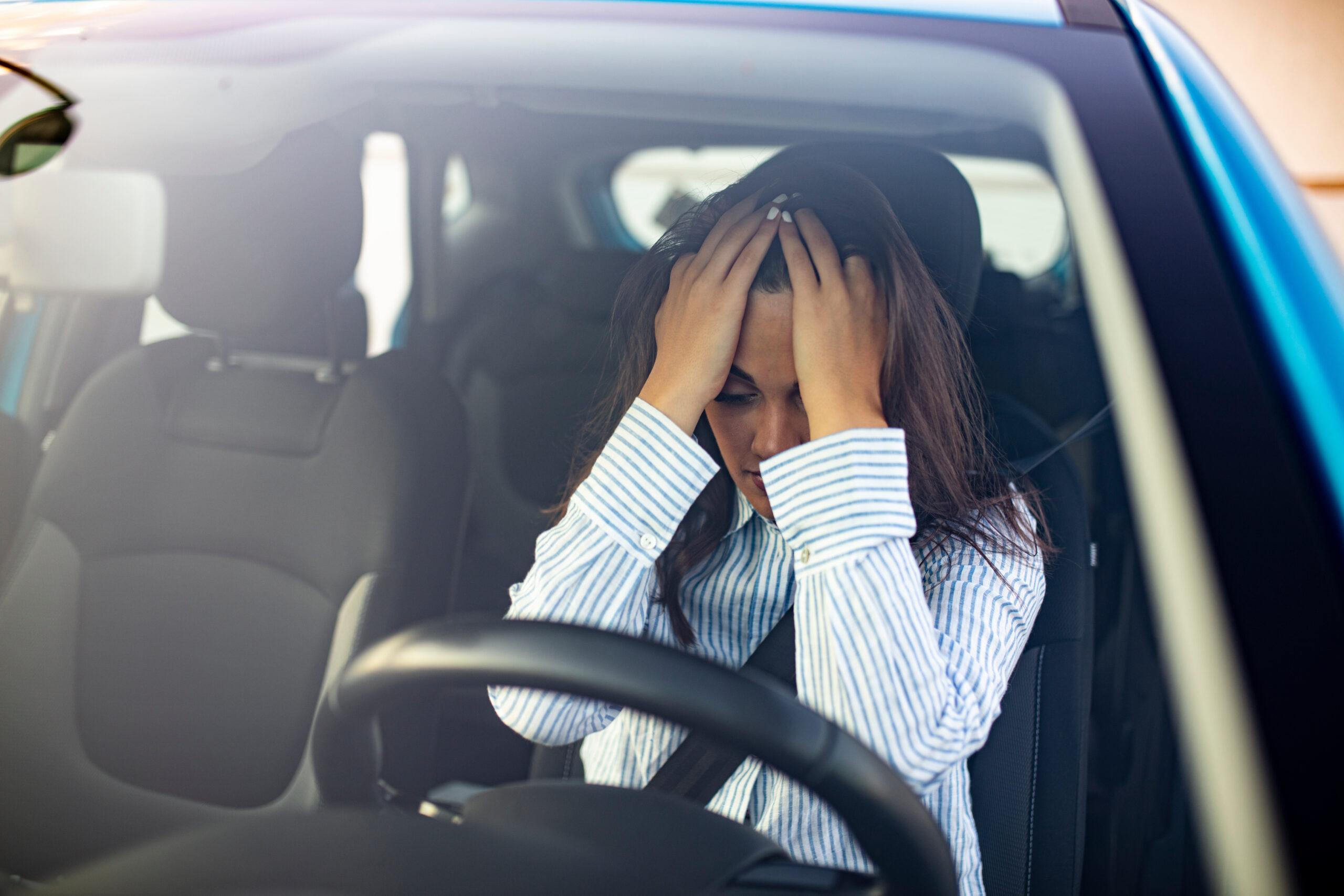 Stressed woman drive car feeling sad and angry. Girl tired, fatigue mental on car. Sleepy and drunk female hangover. Illegal law driver license. Driving when tired and do not drive drowsy concept Stressed woman drive car feeling sad and angry. Girl tired, fatigue mental on car. Sleepy and drunk female hangover. Illegal law driver license. Driving when tired and do not drive drowsy concept
